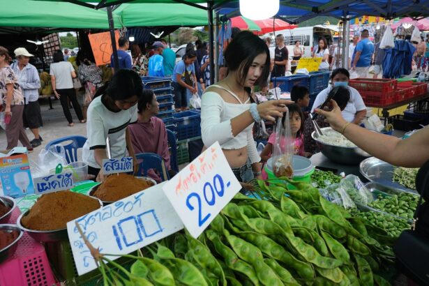 A market stall piled with fresh vegetables