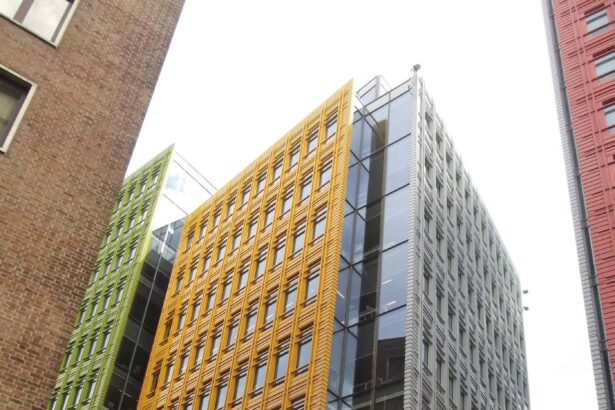 A modern multi-storey office building with a colourful facade